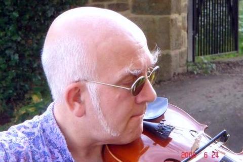 Dave playing the fiddle